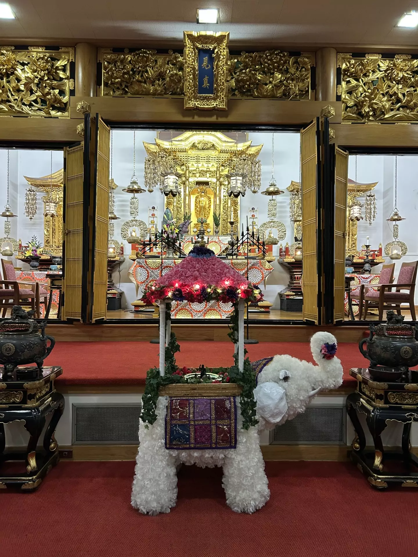 Image of Shin Buddhist altar for Hanamatsuri service celebrating the birth of Sakyamuni Buddha, featuring a white elephant