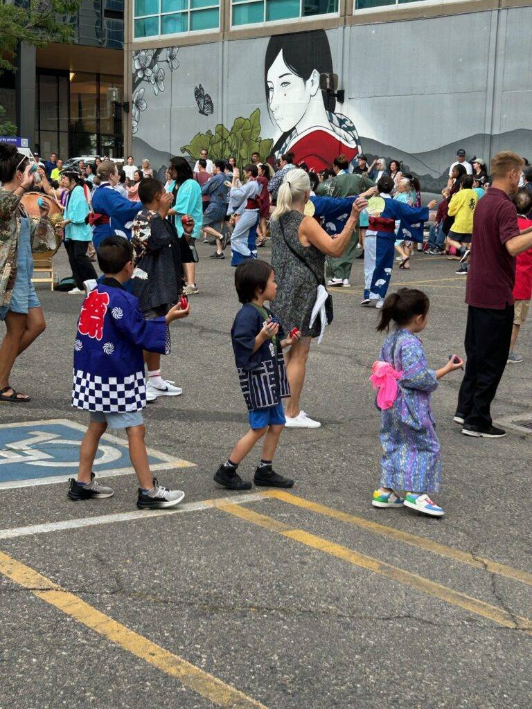 People dancing at Obon in Denver's Sakura Square