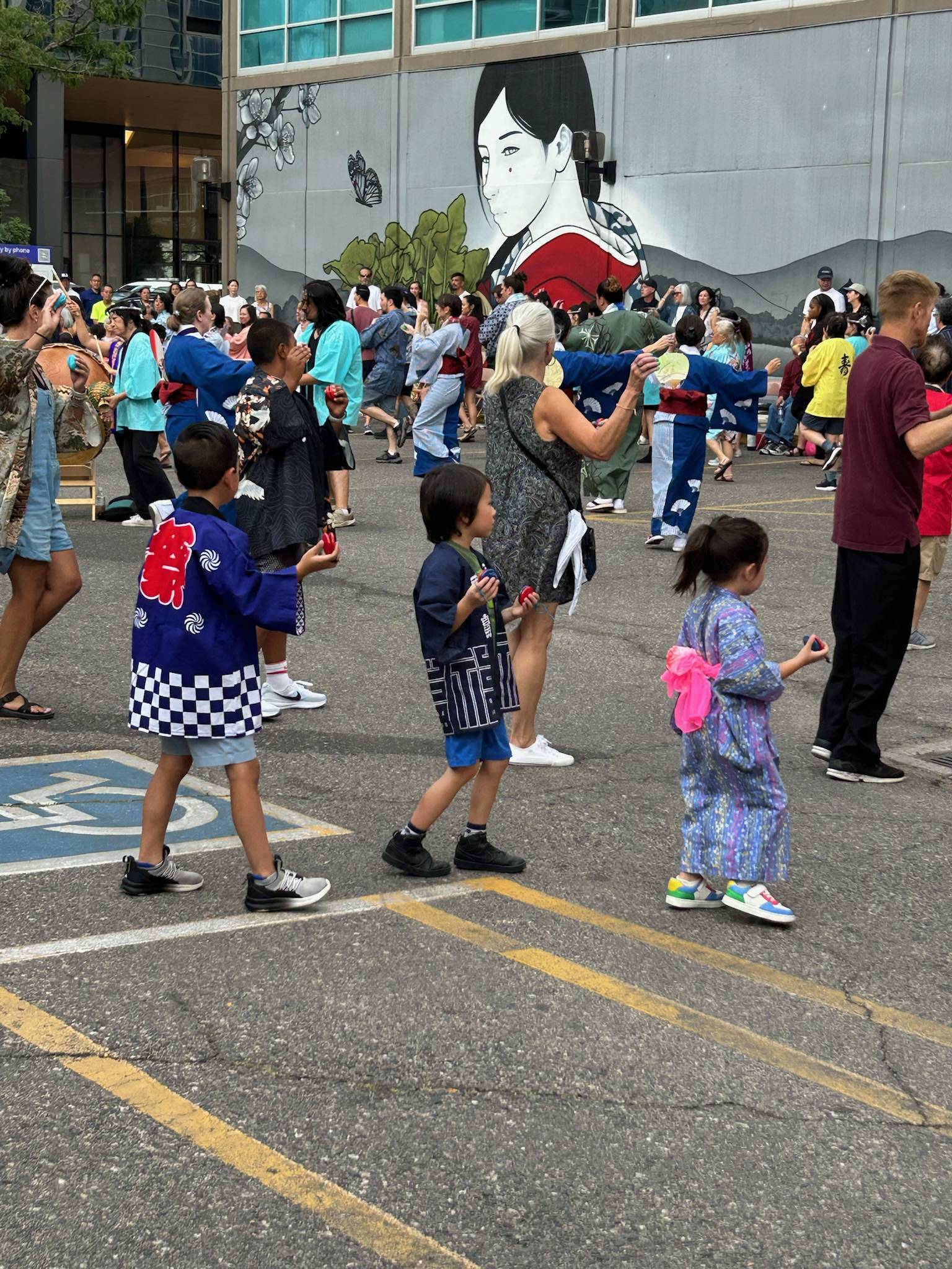People dancing at Obon in Denver's Sakura Square